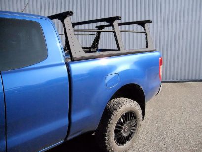 Fixation des barres de toit sur système de portage pour pickup