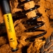 RESSORTS ARRIERE OME REHAUSSE +40/55mm TARAGE +00/300kg  pour LR Discovery 110/130